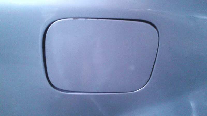 TAPA EXTERIOR COMBUSTIBLE