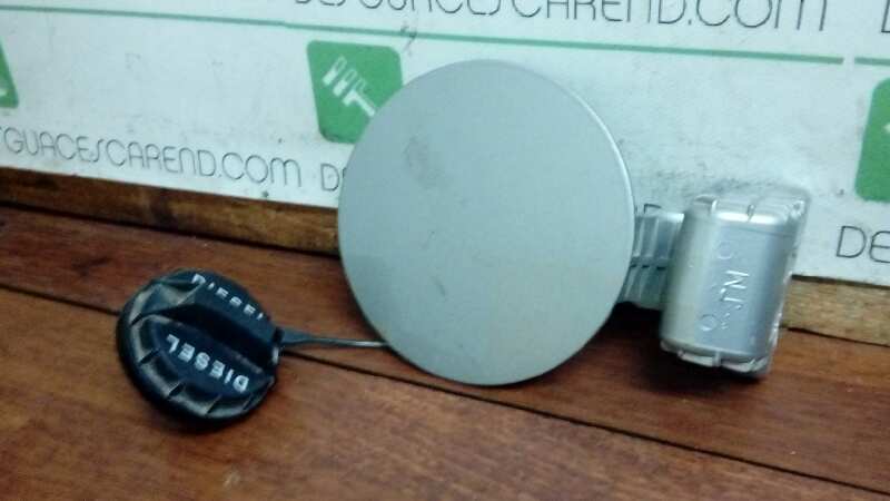 TAPA EXTERIOR COMBUSTIBLE