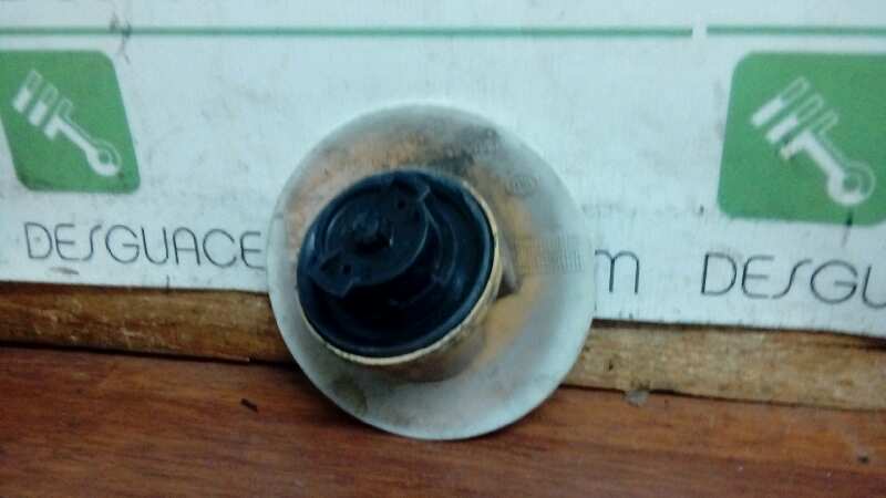 TAPA EXTERIOR COMBUSTIBLE