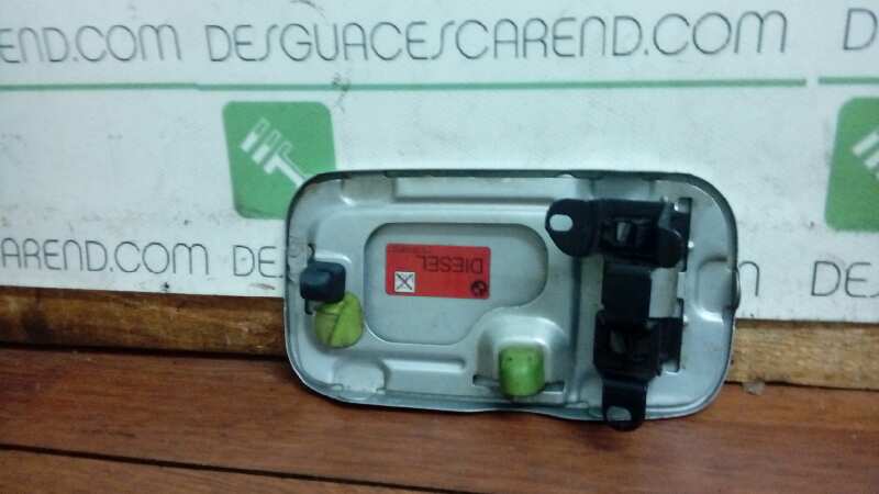 TAPA EXTERIOR COMBUSTIBLE