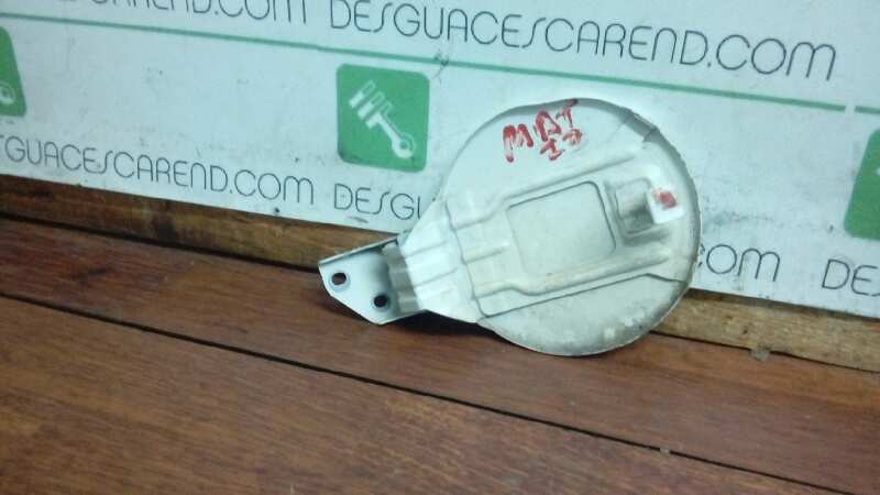 TAPA EXTERIOR COMBUSTIBLE