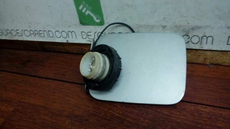 TAPA EXTERIOR COMBUSTIBLE