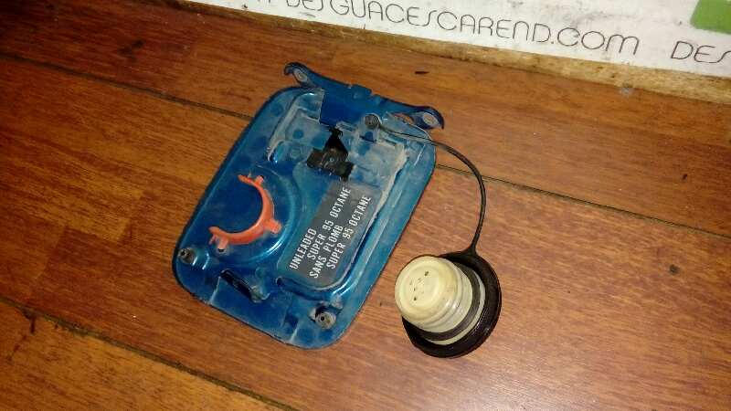 TAPA EXTERIOR COMBUSTIBLE