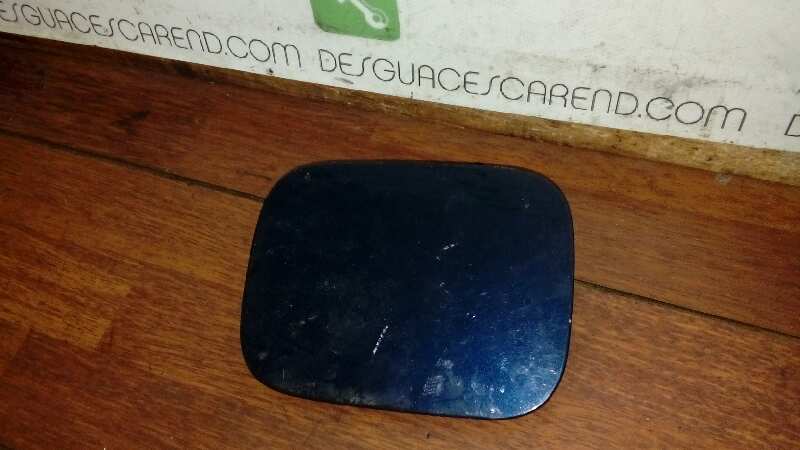 TAPA EXTERIOR COMBUSTIBLE