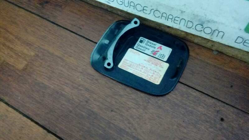 TAPA EXTERIOR COMBUSTIBLE