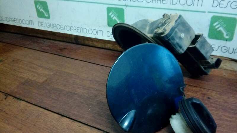 TAPA EXTERIOR COMBUSTIBLE