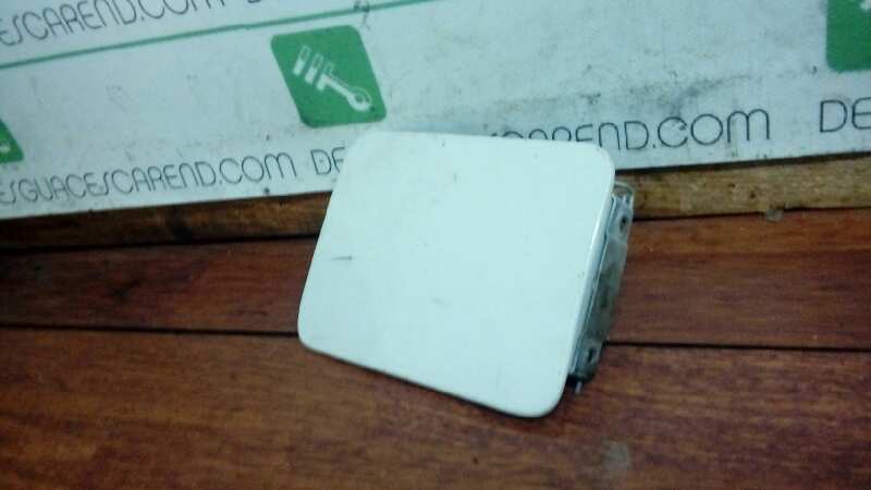 TAPA EXTERIOR COMBUSTIBLE