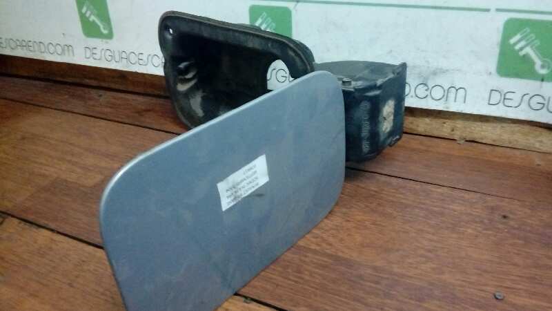 TAPA EXTERIOR COMBUSTIBLE