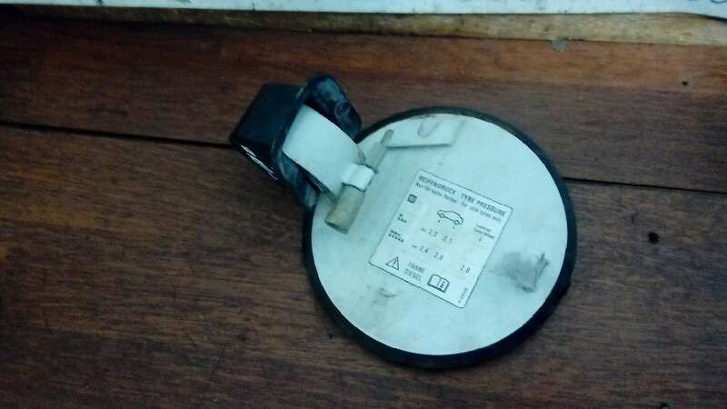 TAPA EXTERIOR COMBUSTIBLE