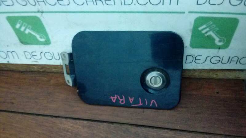 TAPA EXTERIOR COMBUSTIBLE