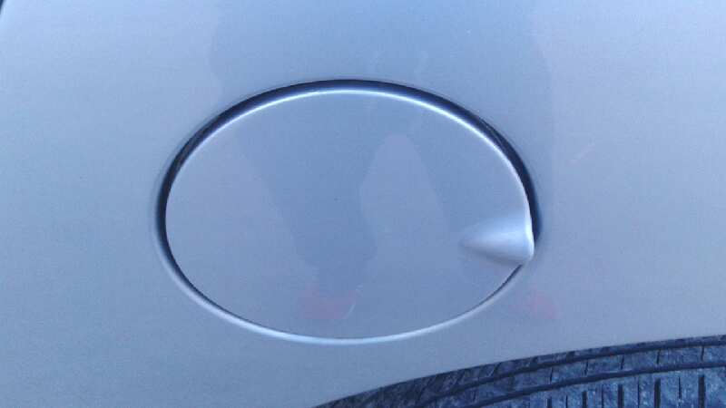 TAPA EXTERIOR COMBUSTIBLE