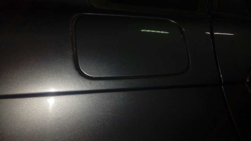 TAPA EXTERIOR COMBUSTIBLE