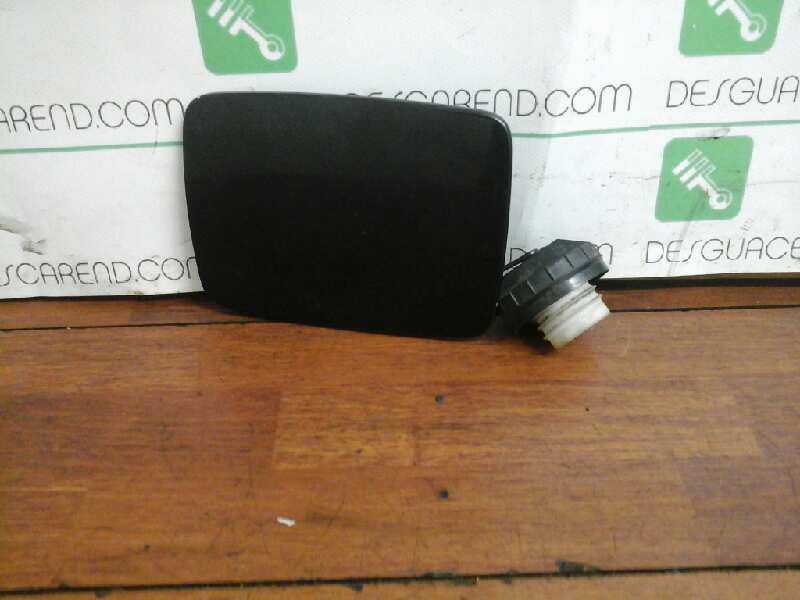 TAPA EXTERIOR COMBUSTIBLE