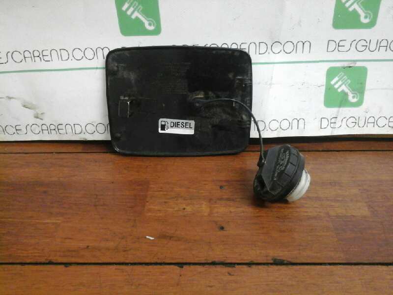 TAPA EXTERIOR COMBUSTIBLE