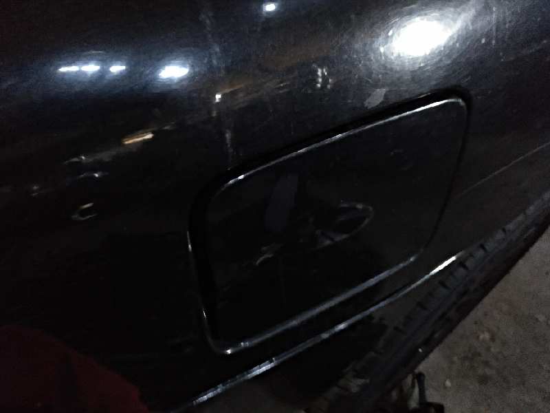 TAPA EXTERIOR COMBUSTIBLE