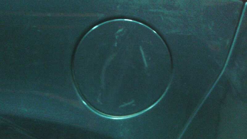 TAPA EXTERIOR COMBUSTIBLE