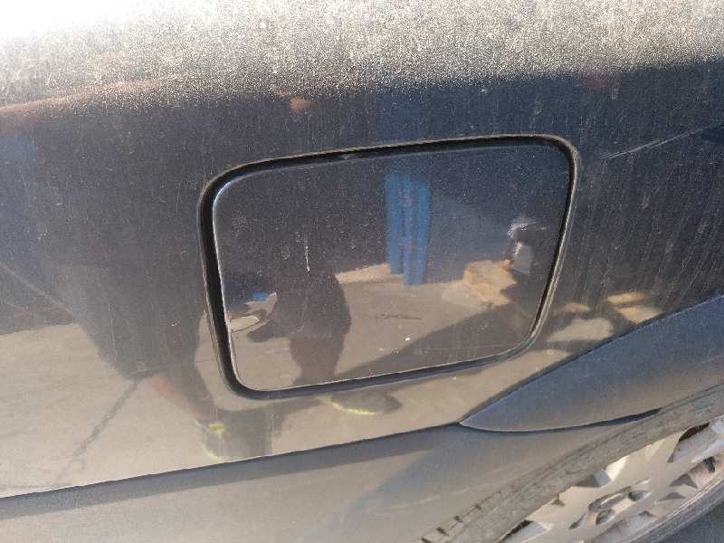 TAPA EXTERIOR COMBUSTIBLE