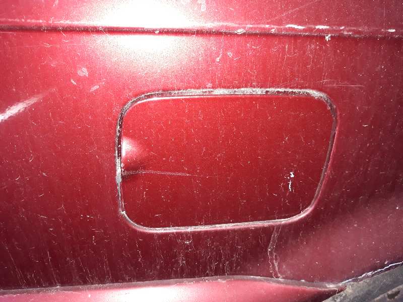 TAPA EXTERIOR COMBUSTIBLE