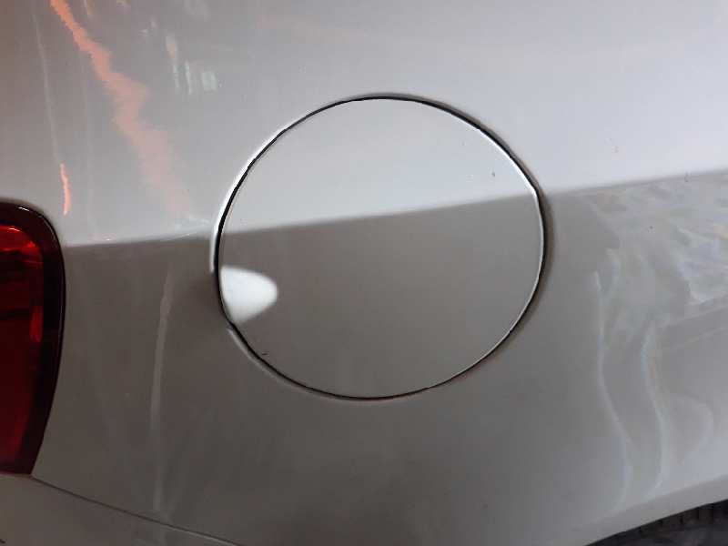 TAPA EXTERIOR COMBUSTIBLE