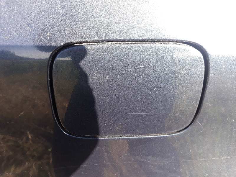 TAPA EXTERIOR COMBUSTIBLE