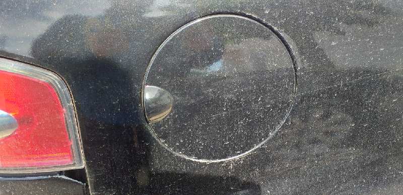 TAPA EXTERIOR COMBUSTIBLE