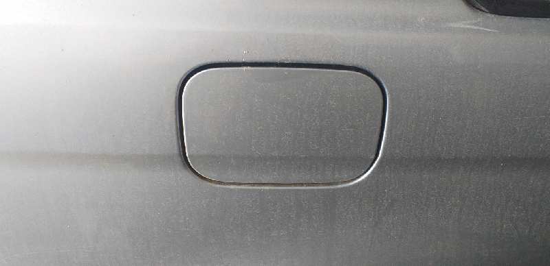 TAPA EXTERIOR COMBUSTIBLE