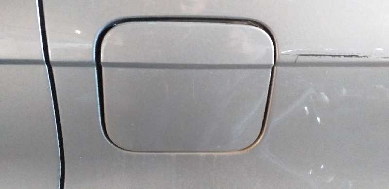 TAPA EXTERIOR COMBUSTIBLE