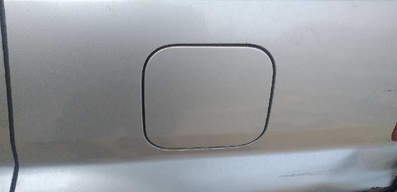 TAPA EXTERIOR COMBUSTIBLE