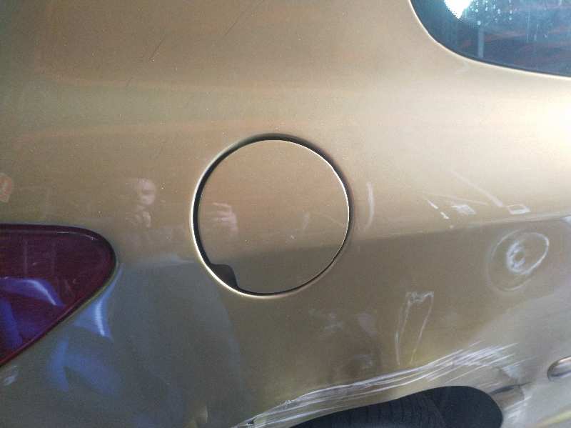 TAPA EXTERIOR COMBUSTIBLE