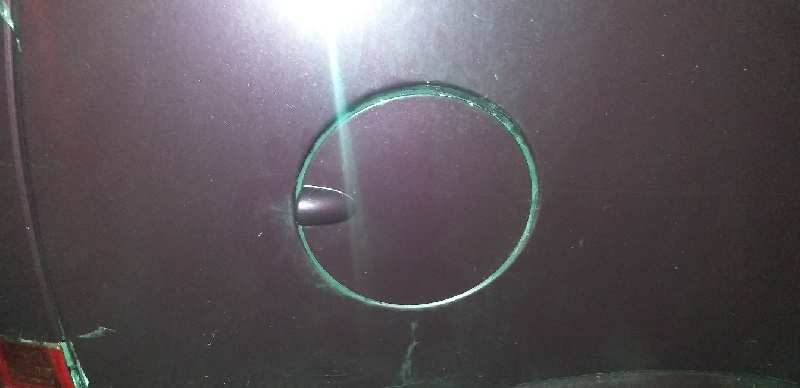 TAPA EXTERIOR COMBUSTIBLE