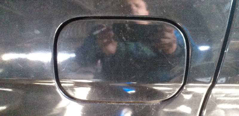 TAPA EXTERIOR COMBUSTIBLE