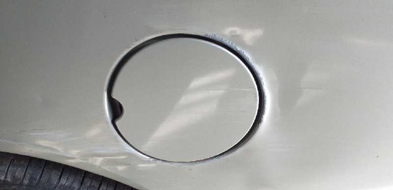 TAPA EXTERIOR COMBUSTIBLE