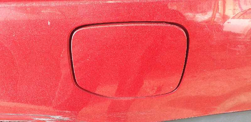 TAPA EXTERIOR COMBUSTIBLE