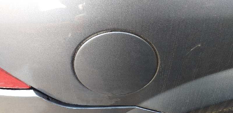 TAPA EXTERIOR COMBUSTIBLE