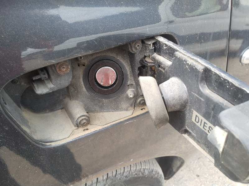 TAPA EXTERIOR COMBUSTIBLE