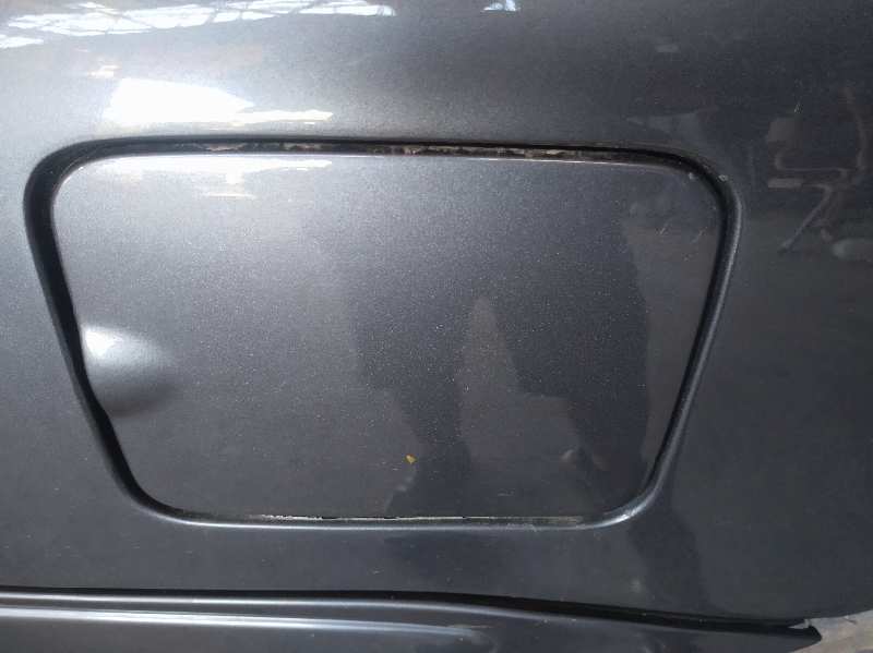 TAPA EXTERIOR COMBUSTIBLE