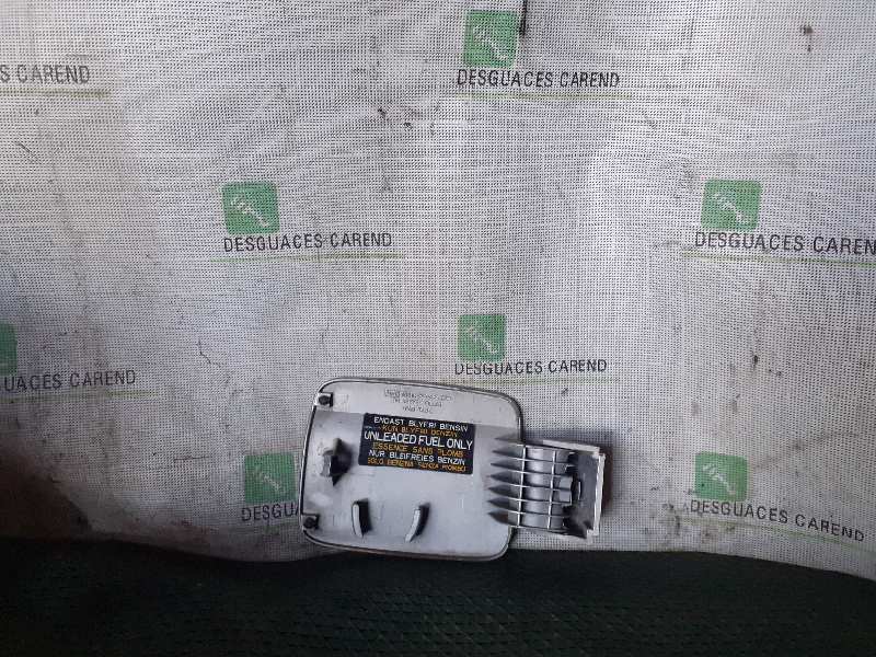 TAPA EXTERIOR COMBUSTIBLE