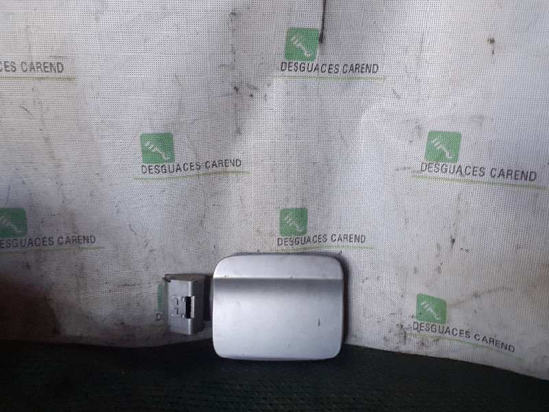 TAPA EXTERIOR COMBUSTIBLE