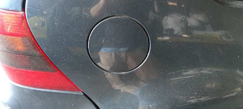 TAPA EXTERIOR COMBUSTIBLE