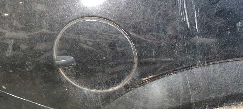 TAPA EXTERIOR COMBUSTIBLE