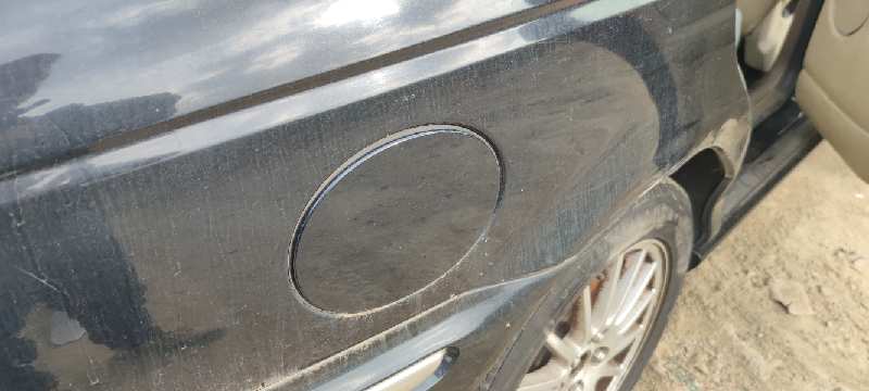 TAPA EXTERIOR COMBUSTIBLE