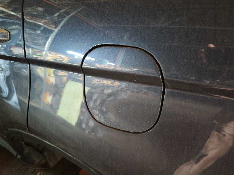 TAPA EXTERIOR COMBUSTIBLE