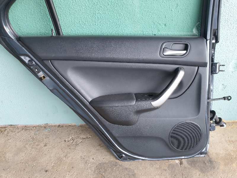 GUARNECIDO PUERTA TRASERA IZQUIERDA