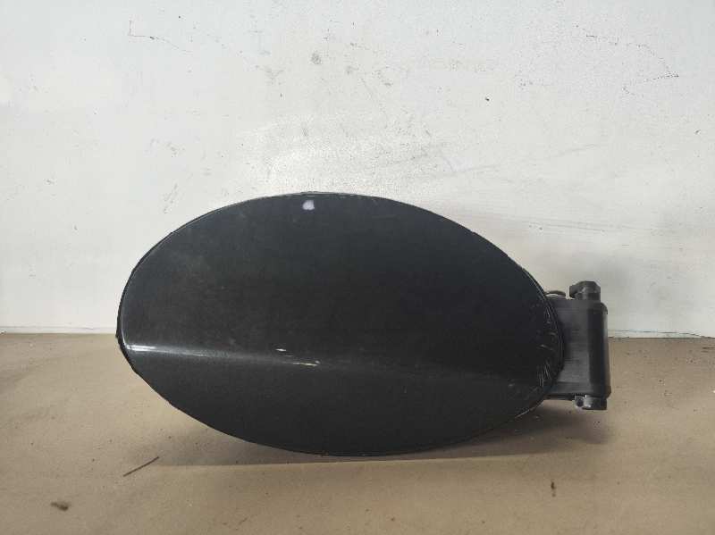 TAPA EXTERIOR COMBUSTIBLE