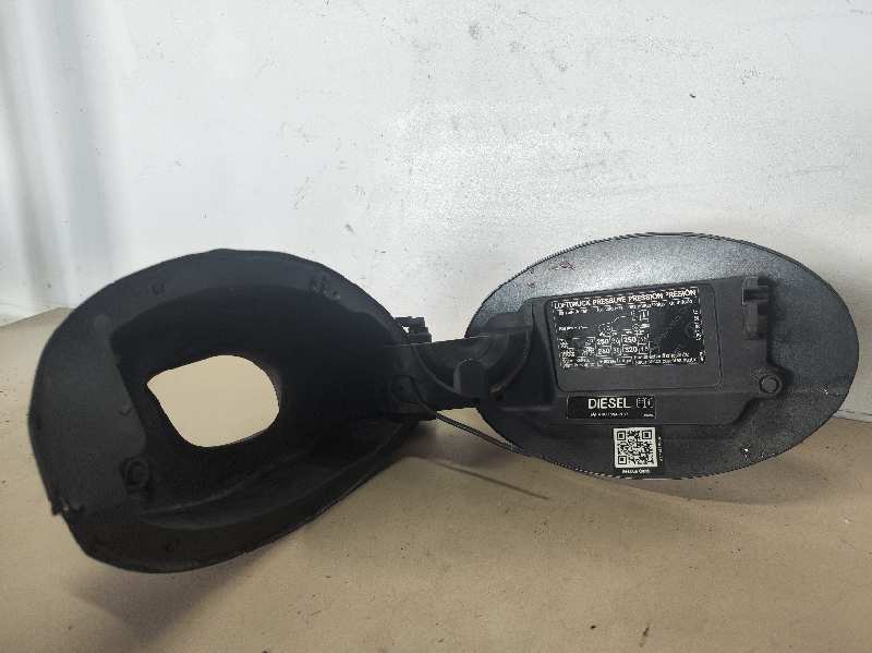 TAPA EXTERIOR COMBUSTIBLE