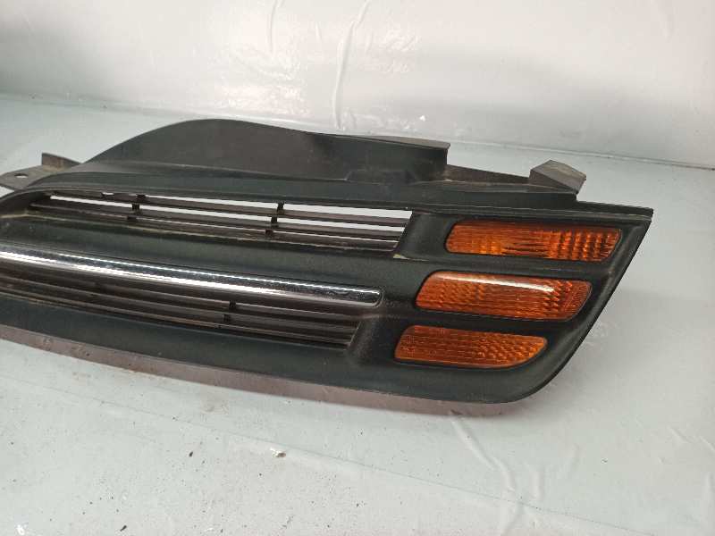 REJILLA PARAGOLPES IZQUIERDA