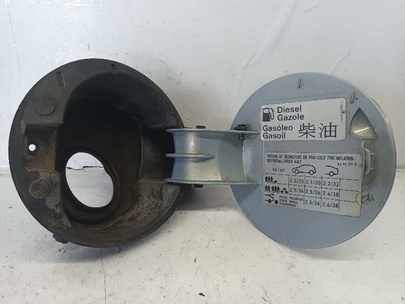 TAPA EXTERIOR COMBUSTIBLE