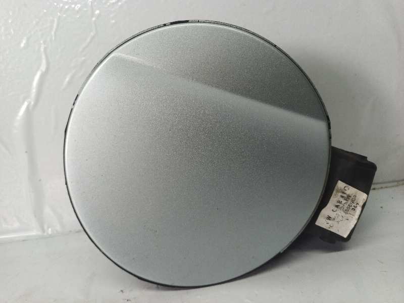 TAPA EXTERIOR COMBUSTIBLE