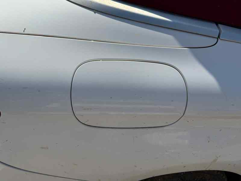 TAPA EXTERIOR COMBUSTIBLE