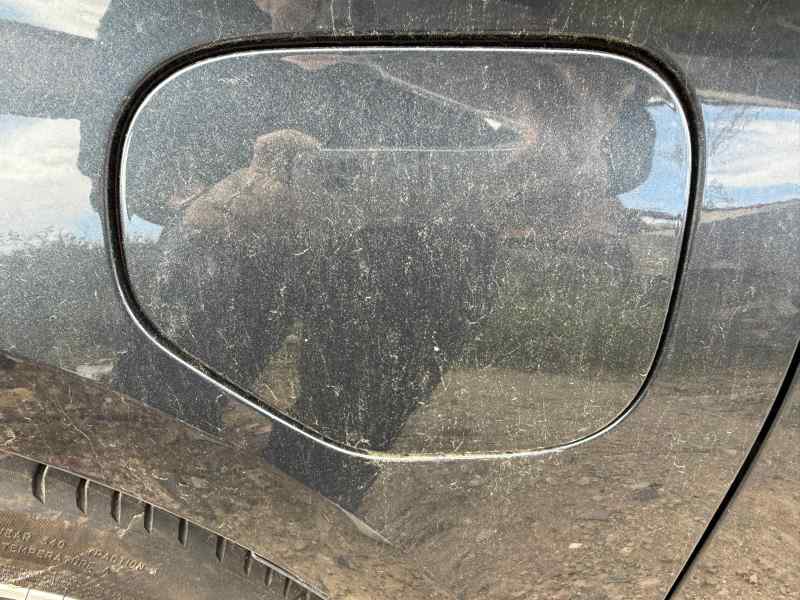 TAPA EXTERIOR COMBUSTIBLE